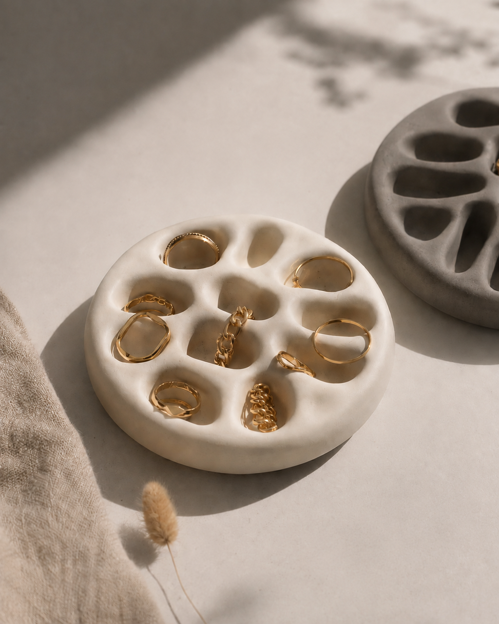 Close up of ring holder tray with gold rings
