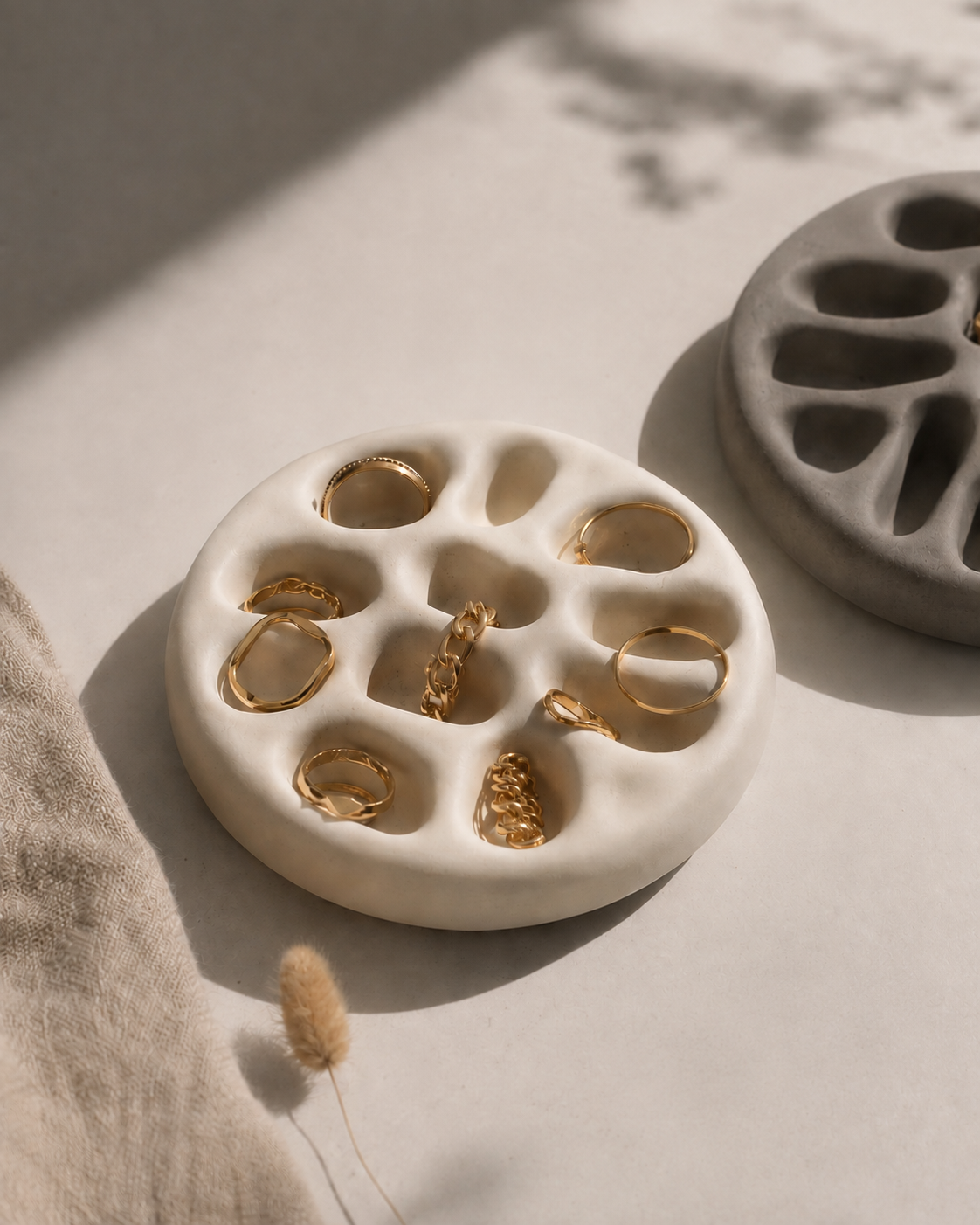 Close up of ring holder tray with gold rings